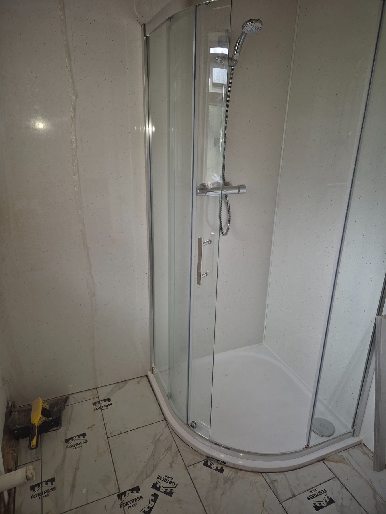 Shower enclosure installation and bathroom repair work